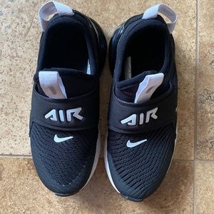 Black and white Nike Air size 11.